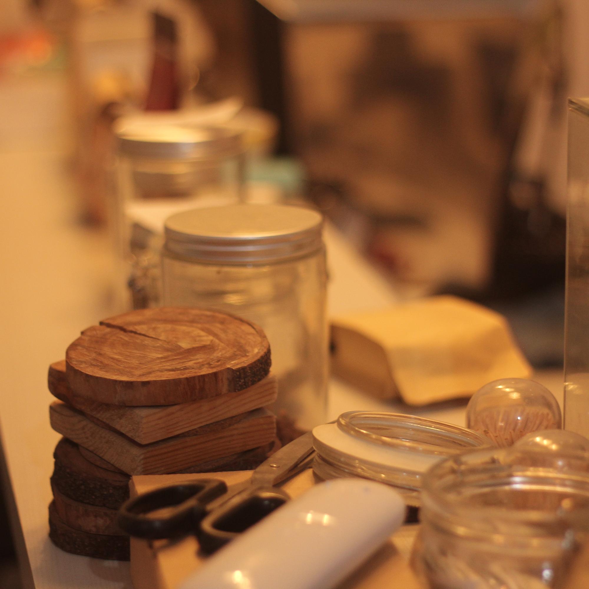 Interior of a small culinary studio with jars and utensils